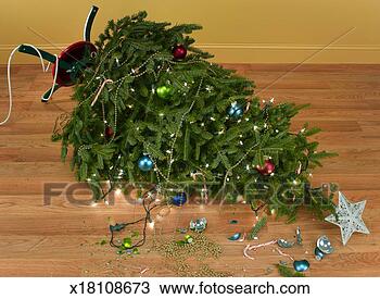 Stock Photo - toppled over christmas 
tree with decorations 
and lights. fotosearch 
- search stock 
photos, pictures, 
images, and photo 
clipart