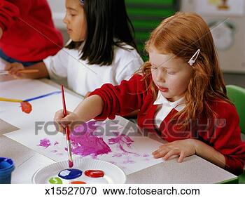 Stock Photography - school children 
(4-6) painting 
at table, elevated 
view. fotosearch 
- search stock 
photos, pictures, 
images, and photo 
clipart
