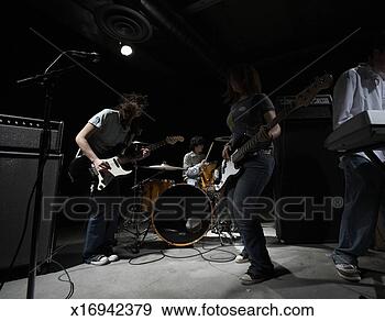 Stock Photograph - teenage (14-16) 
band playing instruments. 
fotosearch - search 
stock photos, 
pictures, images, 
and photo clipart