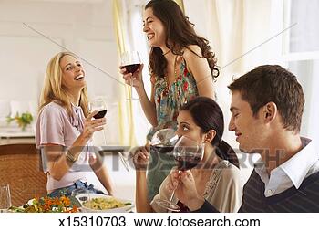 Stock Photo - three young women 
and young man 
drinking red wine, 
two women laughing. 
fotosearch - search 
stock photos, 
pictures, images, 
and photo clipart