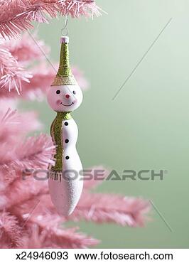 Stock Photo - christmas ornaments 
on pink christmas 
tree, close-up. 
fotosearch - search 
stock photos, 
pictures, images, 
and photo clipart