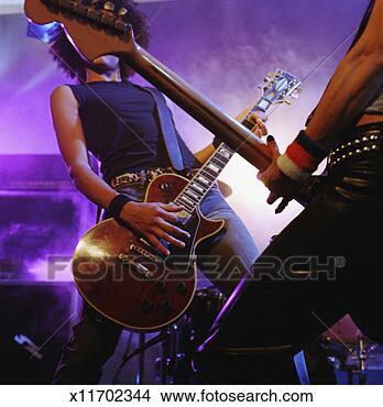 Stock Photo - young women in 
band playing instruments, 
low angle view. 
fotosearch - search 
stock photos, 
pictures, images, 
and photo clipart