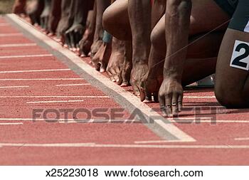 Stock Photo - men's track and 
field sprint race, 
close-up of hands 
on starting line. 
fotosearch - search 
stock photos, 
pictures, images, 
and photo clipart