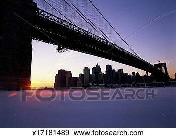Stock Photograph - usa, new york, 
view of downtown 
manhattan and 
brooklyn bridge, 
winter. fotosearch 
- search stock 
photos, pictures, 
images, and photo 
clipart