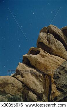 Stock Photo - constellation 
of ursa major 
over sandstone 
formation in mojave 
desert. fotosearch 
- search stock 
photos, pictures, 
images, and photo 
clipart