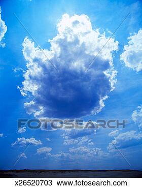 Stock Photo - cumulus clouds 
over sand dunes. 
fotosearch - search 
stock photos, 
pictures, images, 
and photo clipart