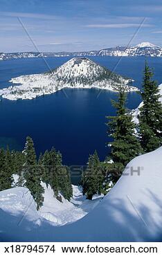 Stock Photo - usa, oregon, crater 
lake national 
park, snow and 
trees by lake, 
winter. fotosearch 
- search stock 
photos, pictures, 
images, and photo 
clipart