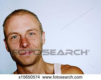 Stock Photo - man with facial 
stubble, smiling, 
close-up, portrait. 
fotosearch - search 
stock photos, 
pictures, images, 
and photo clipart