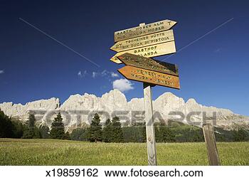 Stock Photo - italy, alto adige, 
dolomites, catinaccio, 
multi directional 
sign post. fotosearch 
- search stock 
photos, pictures, 
images, and photo 
clipart