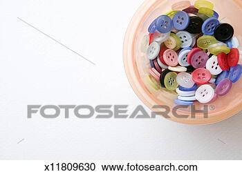 Stock Photography - colored buttons 
in dish, elevated 
view. fotosearch 
- search stock 
photos, pictures, 
images, and photo 
clipart