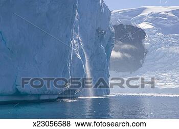 Stock Photo - antarctica, neko 
harbor, waterfall 
in iceberg. fotosearch 
- search stock 
photos, pictures, 
images, and photo 
clipart