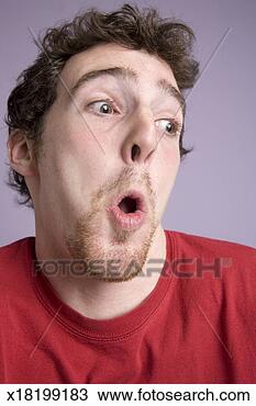 Stock Photo - young man with 
shocked expression, 
close-up. fotosearch 
- search stock 
photos, pictures, 
images, and photo 
clipart