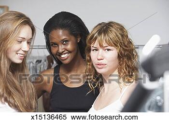 Stock Image - three female models 
backstage at fashion 
show. fotosearch 
- search stock 
photos, pictures, 
images, and photo 
clipart