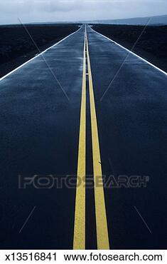 Stock Photography - usa, hawaii islands, 
big island, highway 
across lava bed. 
fotosearch - search 
stock photos, 
pictures, images, 
and photo clipart