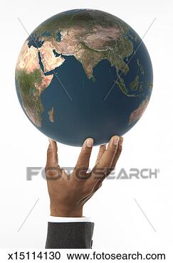 Stock Photography - man holding globe 
with asia, middle 
east and africa 
prominent. fotosearch 
- search stock 
photos, pictures, 
images, and photo 
clipart