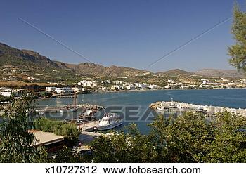 Stock Photo - greece, greek 
islands, crete, 
makrigialos, town 
and harbour. fotosearch 
- search stock 
photos, pictures, 
images, and photo 
clipart