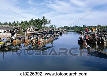 Stock Photo - malaysia, kota 
bahru, mooerd 
fishing boats. 
fotosearch - search 
stock photos, 
pictures, images, 
and photo clipart