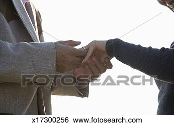 Stock Photo - mature man proposing 
to mature woman 
outdoors, close-up. 
fotosearch - search 
stock photos, 
pictures, images, 
and photo clipart
