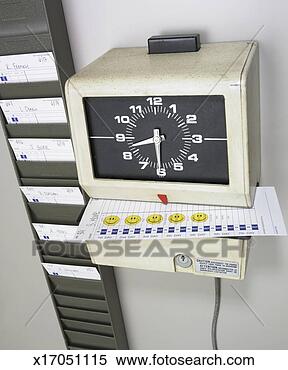 Stock Image - time clock and 
time card. fotosearch 
- search stock 
photos, pictures, 
images, and photo 
clipart
