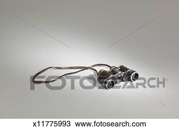 Stock Photo - pair of old fashioned 
binoculars. fotosearch 
- search stock 
photos, pictures, 
images, and photo 
clipart