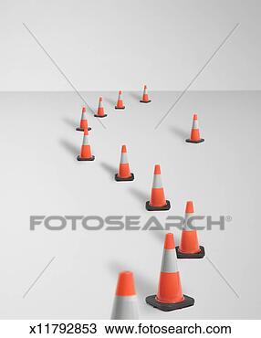 Stock Photo - traffic safety 
cones in curve, 
one off to side 
(digital composite). 
fotosearch - search 
stock photos, 
pictures, images, 
and photo clipart