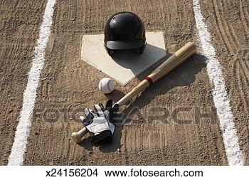 Stock Photo - baseball, bat, 
batting gloves 
and baseball helmet 
at home plate. 
fotosearch - search 
stock photos, 
pictures, images, 
and photo clipart
