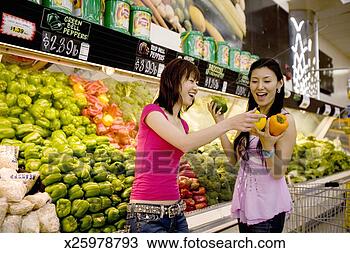Stock Photo - two women in fruit 
market, smiling. 
fotosearch - search 
stock photos, 
pictures, images, 
and photo clipart