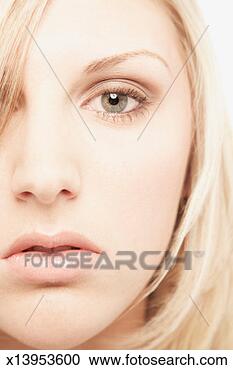 Stock Photography - young woman, portrait, 
close-up of face 
(cropped). fotosearch 
- search stock 
photos, pictures, 
images, and photo 
clipart