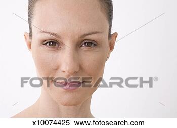Stock Image - mid adult woman 
against white 
background, portrait, 
close-up. fotosearch 
- search stock 
photos, pictures, 
images, and photo 
clipart