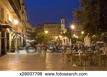 Stock Photo - spain,  valencia, 
 plaza de la reina, 
 people at outdoor 
restaurant. fotosearch 
- search stock 
photos, pictures, 
images, and photo 
clipart