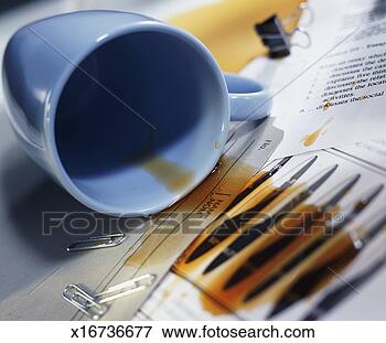 Picture - overturned coffee 
cup; coffee spilled 
over papers and 
file folder. fotosearch 
- search stock 
photos, pictures, 
images, and photo 
clipart