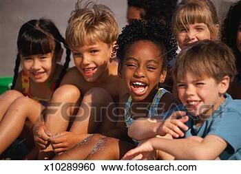 Stock Photography - group of children 
sitting together, 
laughing. fotosearch 
- search stock 
photos, pictures, 
images, and photo 
clipart