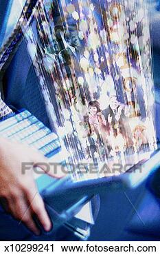 Clipart - business people 
and binary codes 
flowing out of 
laptop monitor. 
fotosearch - search 
clipart, illustration, 
drawings and vector 
eps graphics images