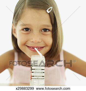 Stock Photograph - portrait of a 
girl (6-7) drinking 
a fruit drink 
with a straw. 
fotosearch - search 
stock photos, 
pictures, images, 
and photo clipart