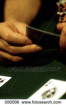 Stock Photo - person playing 
blackjack at a 
casino. fotosearch 
- search stock 
photos, pictures, 
images, and photo 
clipart
