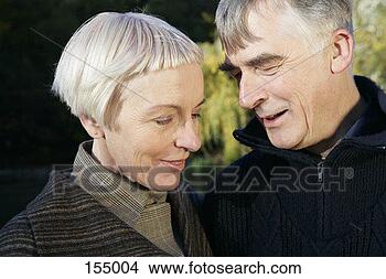 Stock Photo - close up of a 
senior couple 
standing close 
to each other. 
fotosearch - search 
stock photos, 
pictures, images, 
and photo clipart