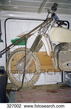 Stock Photo - dirt bike tied 
up in vehicle. 
fotosearch - search 
stock photos, 
pictures, images, 
and photo clipart