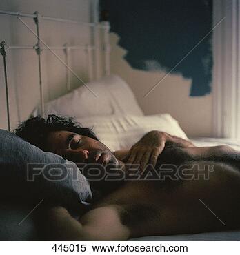 man-sleeping-bed_%7E445015.jpg