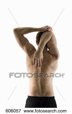 Picture - rear view of a 
male stretching 
his arm behind 
his head. fotosearch 
- search stock 
photos, pictures, 
images, and photo 
clipart