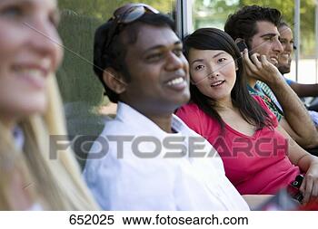 Stock Image - university students 
socializing on 
campus. fotosearch 
- search stock 
photos, pictures, 
images, and photo 
clipart