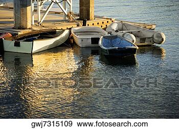 Stock Photograph - high angle view 
of boat's docked 
at a pier,  san 
diego bay. fotosearch 
- search stock 
photos, pictures, 
images, and photo 
clipart