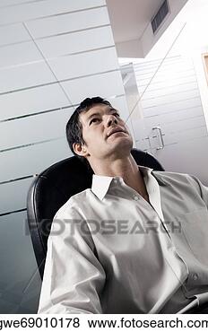 Stock Photo - close-up of a 
businessman thinking. 
fotosearch - search 
stock photos, 
pictures, images, 
and photo clipart
