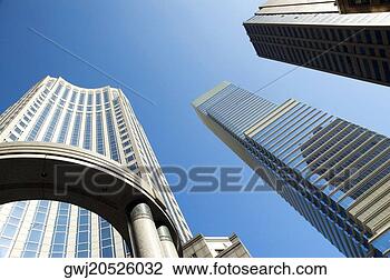 Stock Photo - low angle view 
of skyscrapers 
in a city,  new 
york city,  new 
york. fotosearch 
- search stock 
photos, pictures, 
images, and photo 
clipart