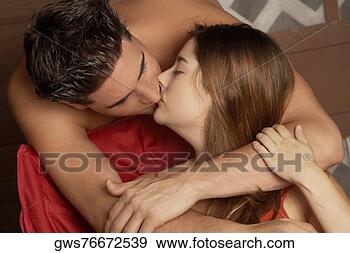 Stock Photograph - close-up of a 
young couple kissing 
each other. fotosearch 
- search stock 
photos, pictures, 
wall murals, images, 
and photo clipart