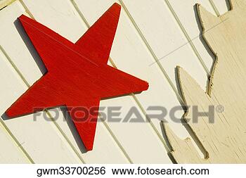 Stock Photo - close-up of a 
star shape on 
a wooden surface. 
fotosearch - search 
stock photos, 
pictures, wall 
murals, images, 
and photo clipart