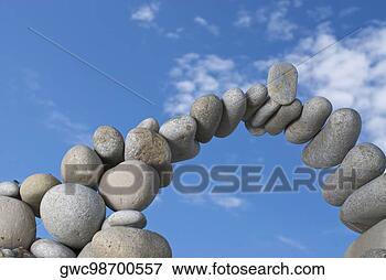 Picture - low angle view 
of stones arranged 
in an arch shape. 
fotosearch - search 
stock photos, 
pictures, images, 
and photo clipart