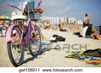 Stock Photography - close-up of a 
bicycle on the 
beach, south beach, 
miami, florida, 
usa. fotosearch 
- search stock 
photos, pictures, 
images, and photo 
clipart