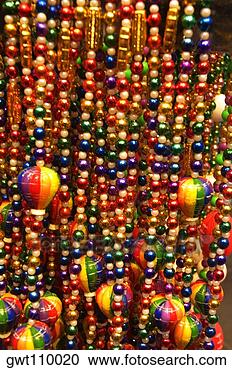 Stock Photography - close-up of multi-colored 
necklaces, new 
orleans, louisiana, 
usa. fotosearch 
- search stock 
photos, pictures, 
images, and photo 
clipart