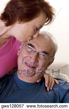 Picture - close-up of a 
senior woman kissing 
a senior man. 
fotosearch - search 
stock photos, 
pictures, images, 
and photo clipart