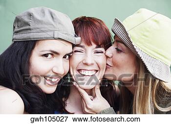 Picture - close-up of two 
young women and 
a mid adult woman 
smiling. fotosearch 
- search stock 
photos, pictures, 
images, and photo 
clipart